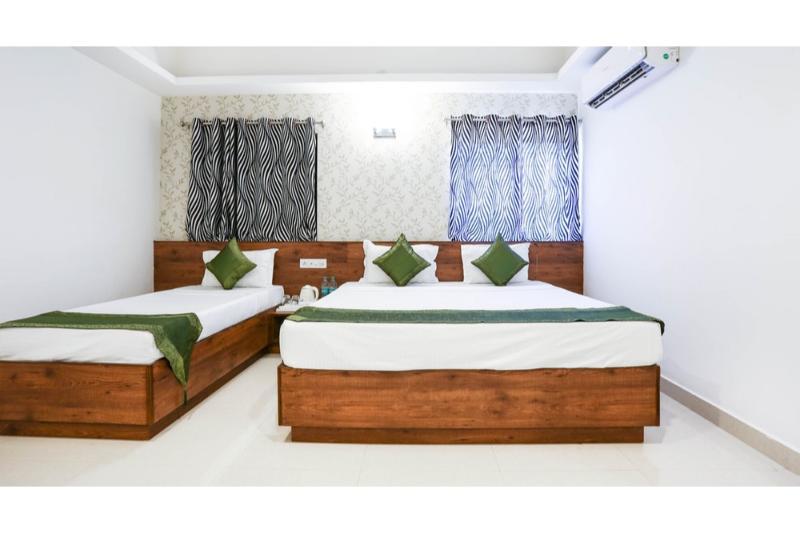 Treebo Pappilon Palace - Pvs Circle Mangalore Bagian luar foto